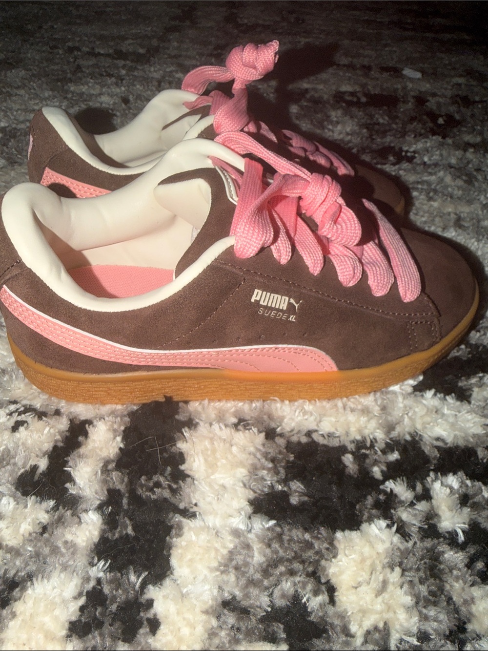 Puma brown sneakers with pink accents